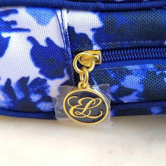 NWT. Estee Lauder Blue & White Floral w/Lining and Logo Zip Handle Cosmetic Bag. - Picture 3 of 5